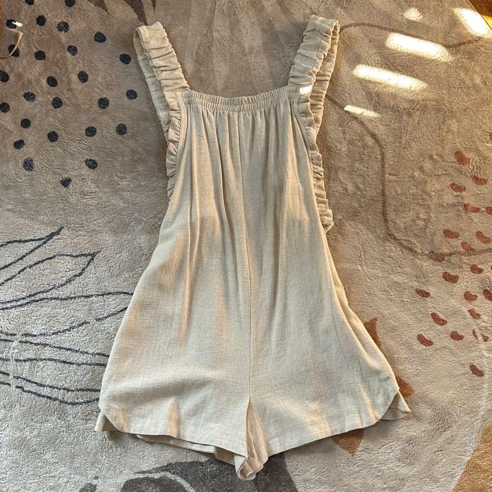 Candidly Chan Beige Ruffle Strap Romper